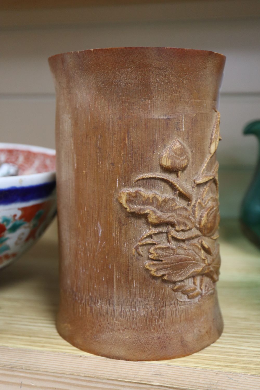 A Chinese bamboo brushpot, an Imari bowl, a Chinese vase, a bowl, a jar and two lids, largest diameter 28cm